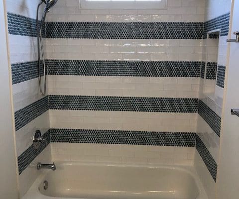 black and white striped tile tub install for bathroom makeover in maryland